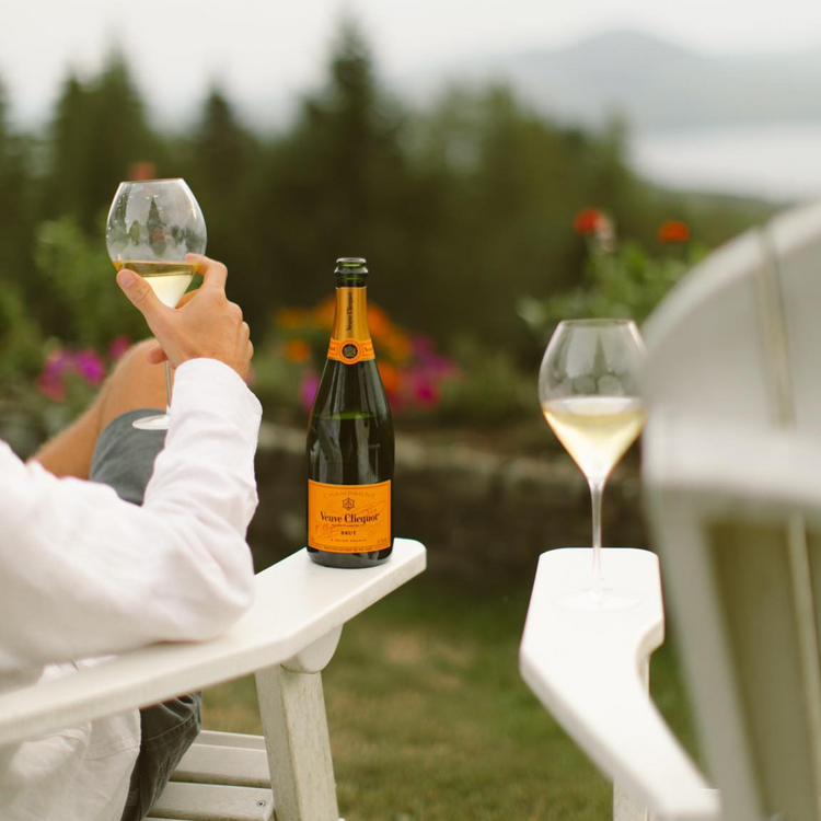 Drinking Veuve yellow label champagne