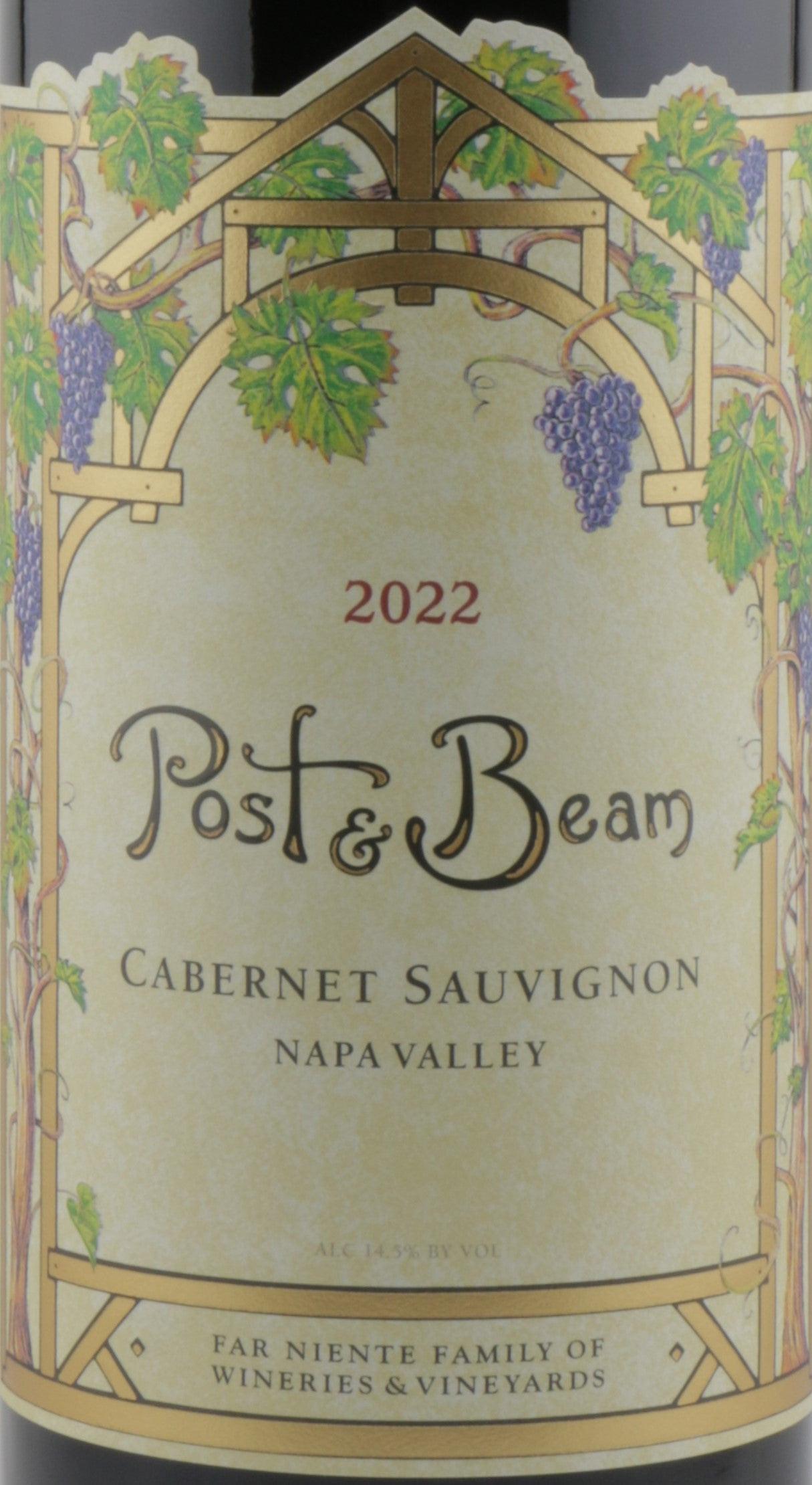 Elegant bottle of Cabernet Sauvignon wine displayed alongside rustic Post & Beam architecture