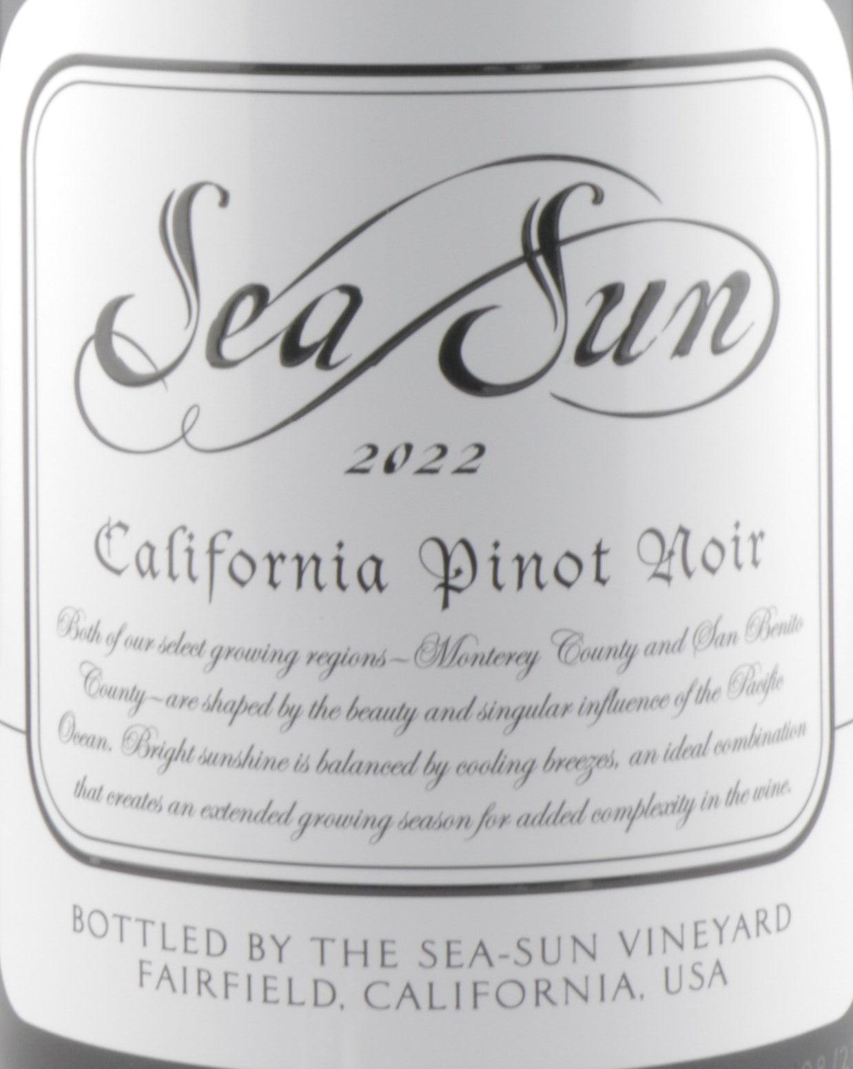 California Pinot Noir wine bottle featuring Sea Sun Pinot Noir label in vineyard background