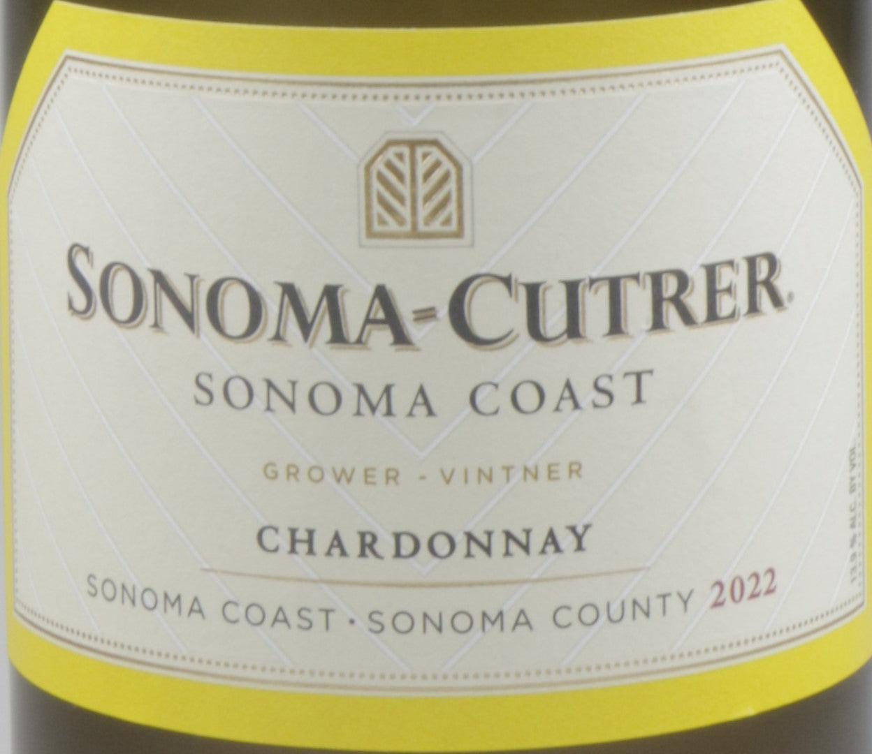 Fresh Chardonnay grapes growing in the Sonoma Coast vineyards, producing rich flavors from Sonoma