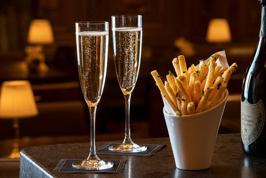 Elevate Your Snacking: Truffle Fries + Champagne.