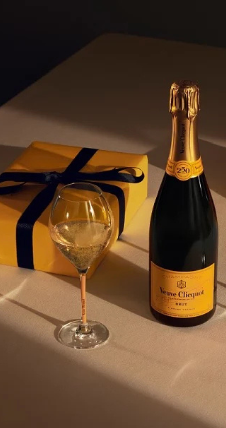 Holiday Champagne gift set featuring Veuve Clicquot and Moet, luxury 4 bottle collection for festive celebrations