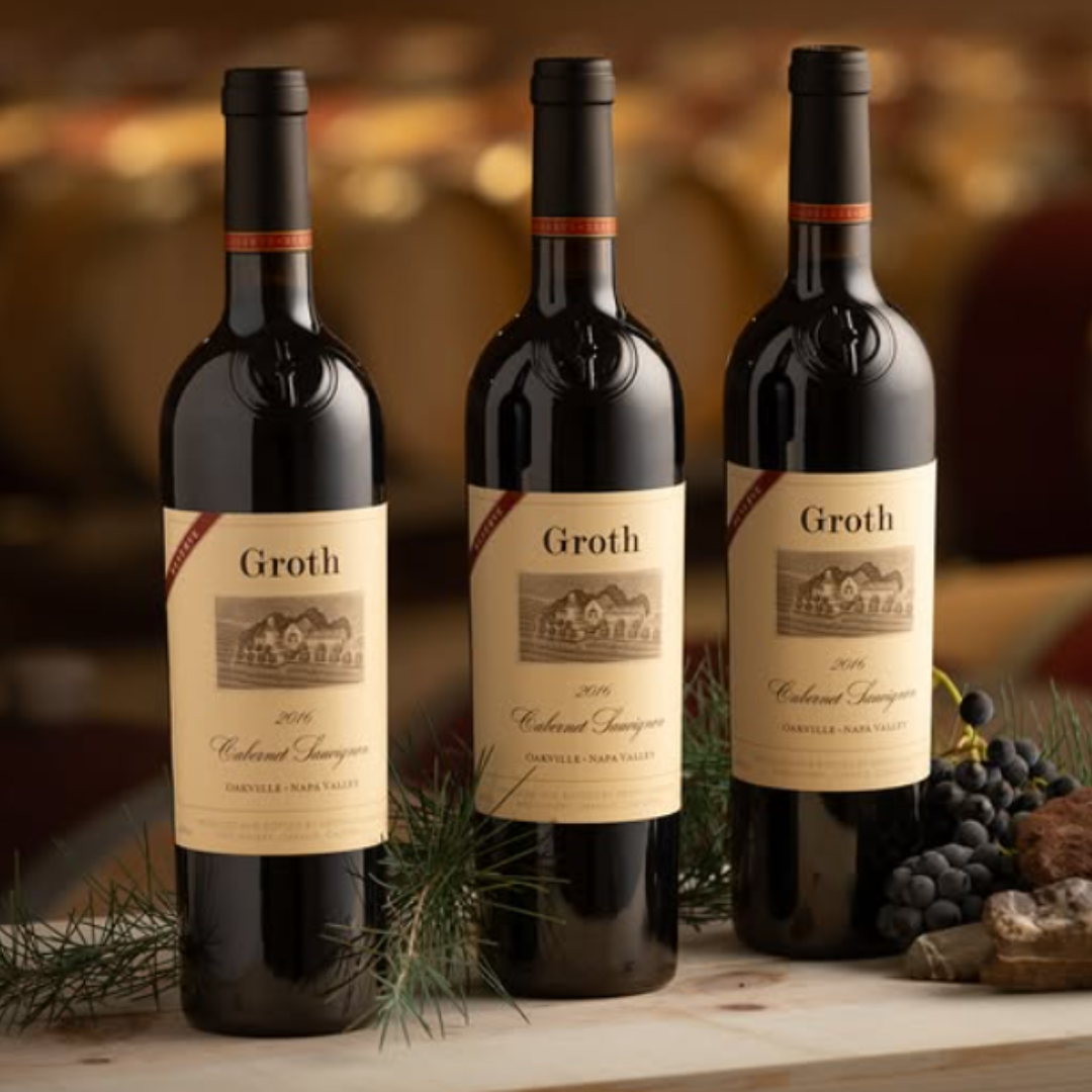 Three bottles of Groth Cabernet Sauvignon wine with a blurred background