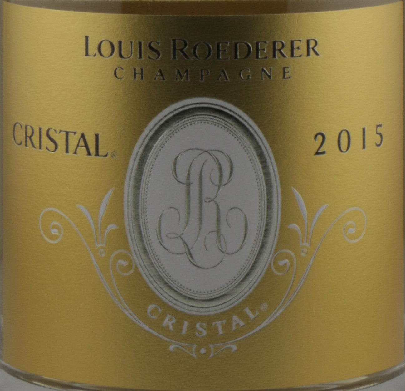 Louis Roederer Cristal Champagne bottle label from 2015 on a gold background