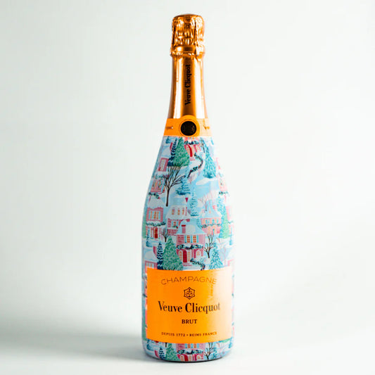 Veuve Clicquot champagne bottle with a decorative label on a white background
