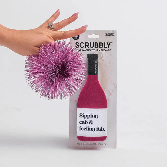 Pink Scrubbly kitchen sponge with packaging on a white background